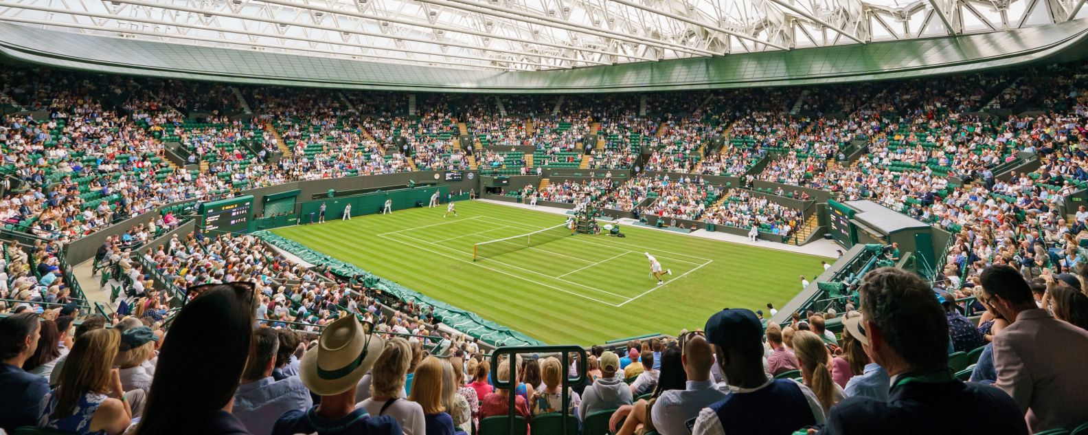 Inside view of Wimbledon Stadium with the people watching a tennis match