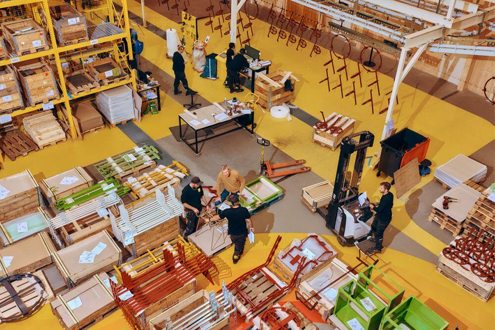 aerial view of factory floor with workers