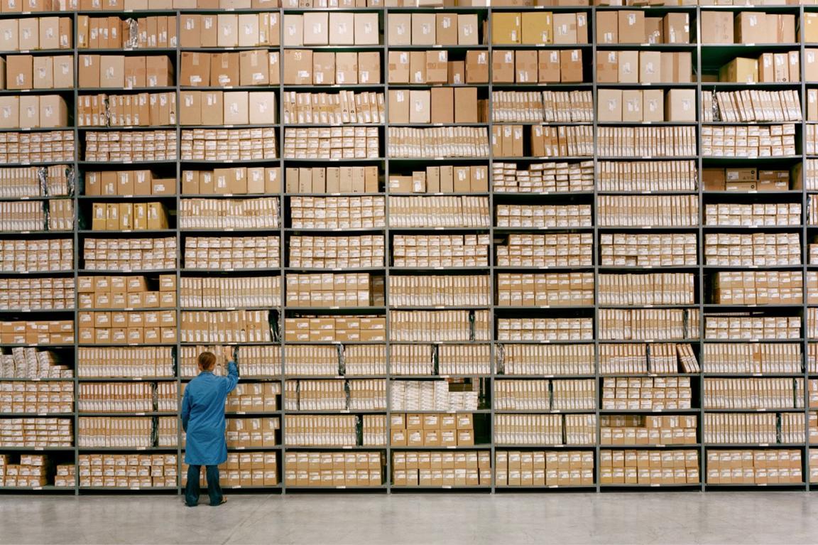 document archive warehouse with stacked shelves