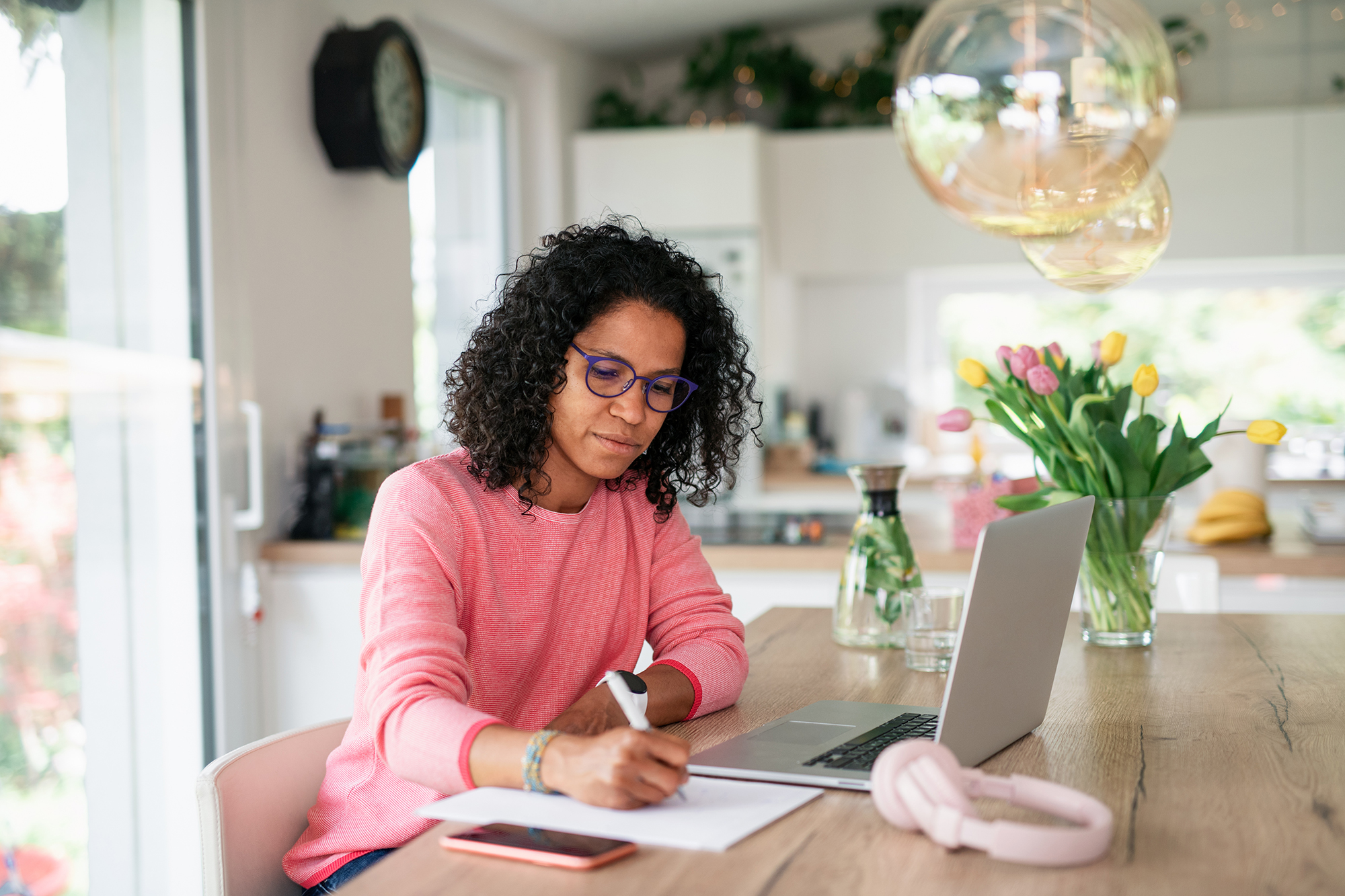 multiracial woman working remotely