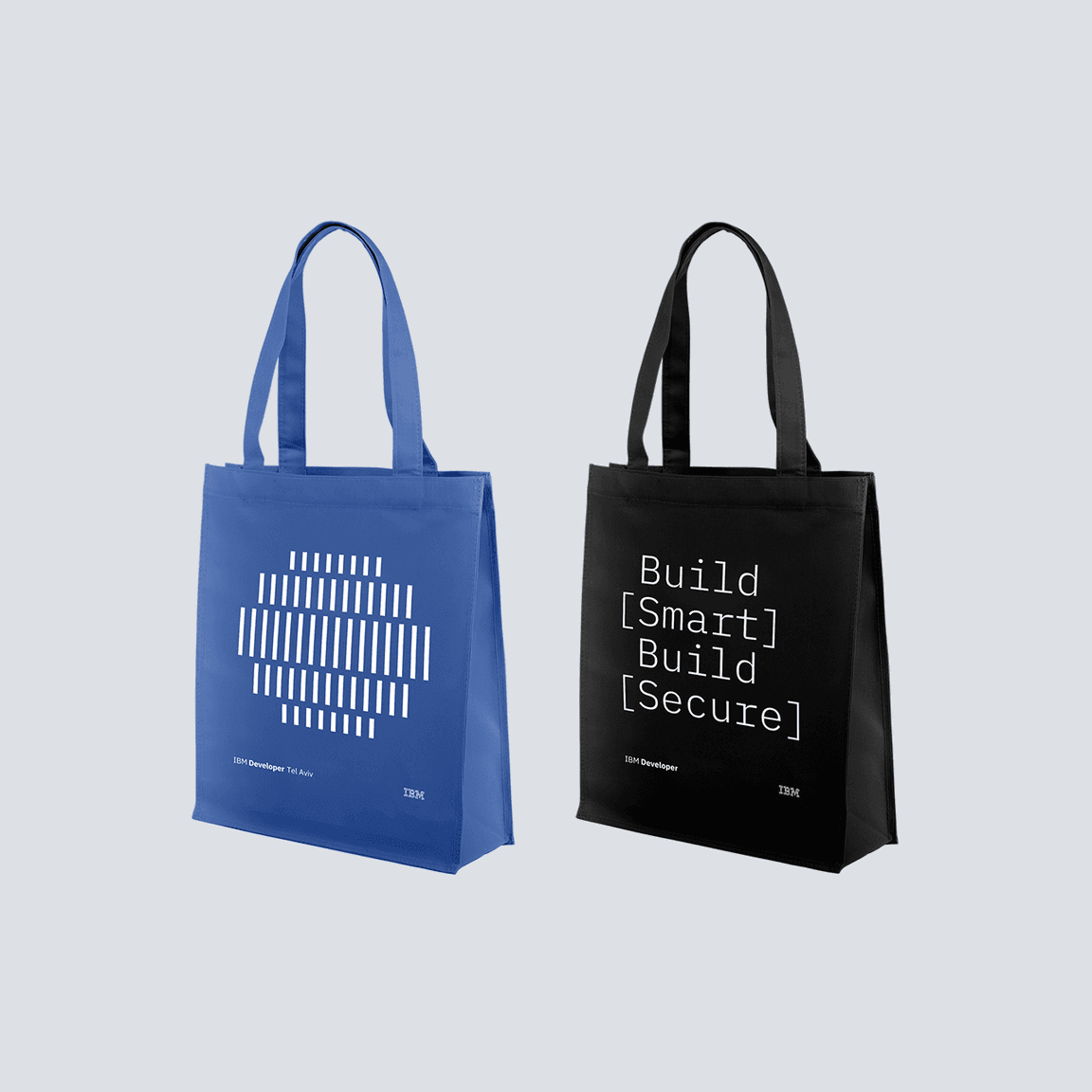 Blue and black IBM Developer tote bags