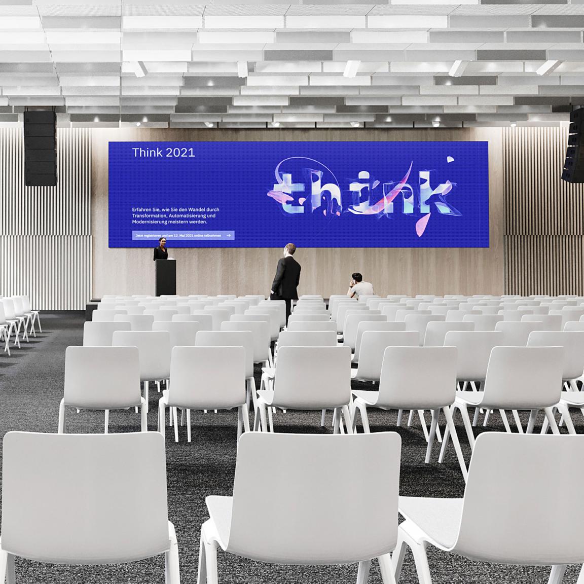 conference room with digital display behind speaker podium