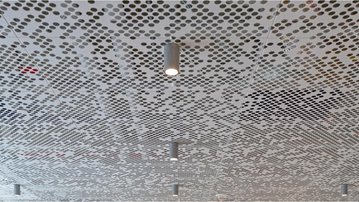 perforated metal ceiling with spot lights