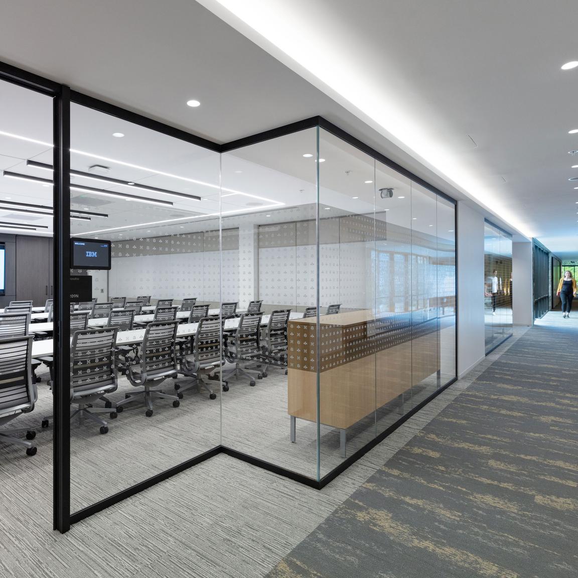 enclosed meeting space with glass walls
