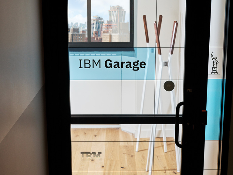 Glass door with IBM Garage name on it