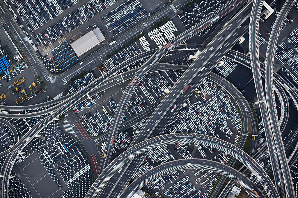 An aerial shot of a city with highways