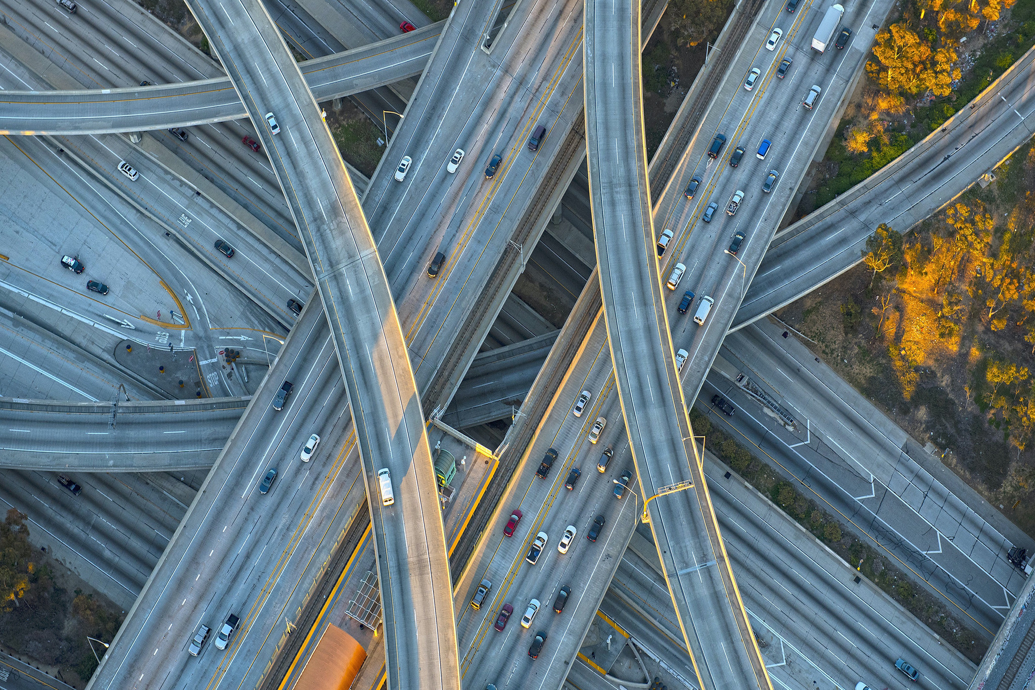 Multilevel highway with traffic and looping on/off ramps